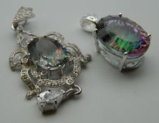 Two silver and cubic zirconia multi-coloured pendants. The largest 6 cm high.