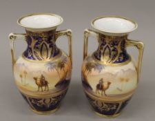 A pair of Noritake vases. 18 cm high.