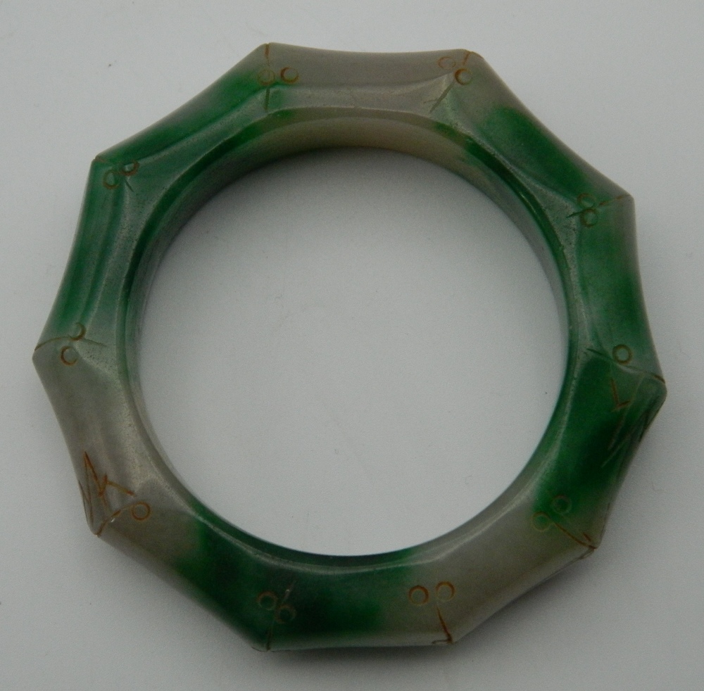 A jade faux bamboo carved bangle. 8 cm diameter. - Image 2 of 3