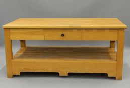 A modern oak kitchen island. 168 cm long x 91 cm wide. The property of Germaine Greer.