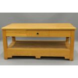 A modern oak kitchen island. 168 cm long x 91 cm wide. The property of Germaine Greer.