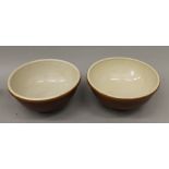 Two large stoneware mixing bowls. Each 31 cm diameter.