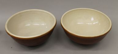 Two large stoneware mixing bowls. Each 31 cm diameter.