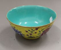 A Chinese yellow porcelain bowl. 16 cm diameter.