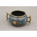 A Chinese cloisonne decorated bronze censer. 16 cm wide.