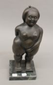 After BETERO, bronze model of a nude female. 37 cm high.