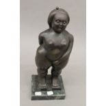 After BETERO, bronze model of a nude female. 37 cm high.