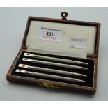 A cased set of silver bridge pencils. Each 8.5 cm long.