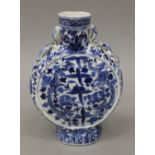 A 19th century Chinese blue and white porcelain moon flask. 21.5 cm high.
