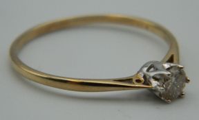 A 9 ct gold 0.25 carat diamond solitaire ring. Ring Size P. 1 gram total weight.