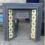 A Victorian cast iron fireplace. 96.5 cm wide x 96.5 cm high.