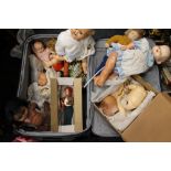 A collection of vintage dolls, etc.