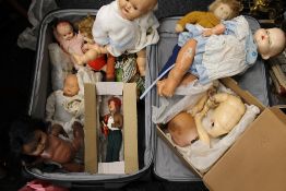 A collection of vintage dolls, etc.