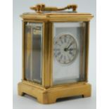 A miniature carriage clock. 7.5 cm high.