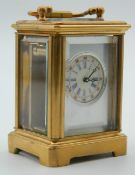 A miniature carriage clock. 7.5 cm high.