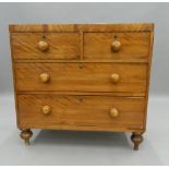 A Victorian satin walnut caddy top chest of drawers. 87.5 cm wide. The property of Germaine Greer.