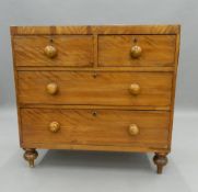 A Victorian satin walnut caddy top chest of drawers. 87.5 cm wide. The property of Germaine Greer.