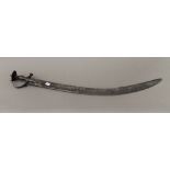 An 18th century all steel fighting Tulwar. 86.5 cm long.