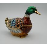 A small enamel box formed as a duck. 6 cm high.