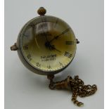 A pendant ball watch. 8 cm high overall.