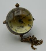 A pendant ball watch. 8 cm high overall.