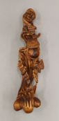 A Chinese carved wooden ruyi sceptre. 38 cm long.