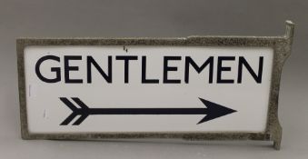 A London Underground double sided Gentleman enamel sign, in original frame. 67.5 cm long.