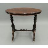 A Victorian rosewood centre table. 75.5 cm wide.