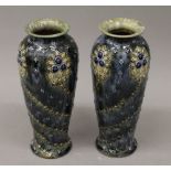 A pair of Art Nouveau Doulton Lambeth vases. 25 cm high.