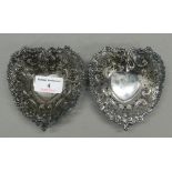 A pair of sterling silver pierced heart shaped bon bon dishes. 9.5 cm wide. 2.1 troy ounces.