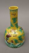 A Chinese yellow ground porcelain bottle vase.