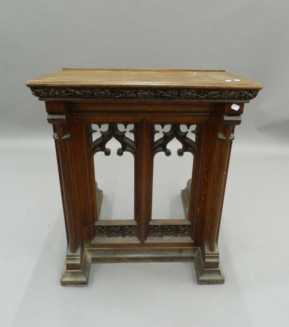 A Victorian carved oak lectern. 68.5 cm wide, 84 cm high, 61 cm deep. - Image 2 of 12