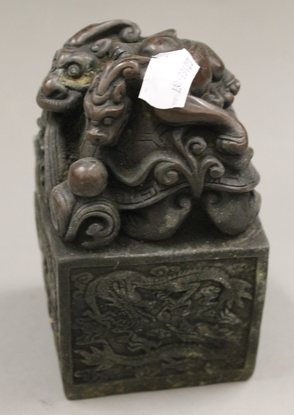 A bronze dragon seal. 12.5 cm high.