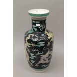 A Chinese famille noir porcelain vase. 44 cm high.