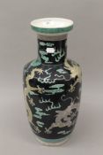 A Chinese famille noir porcelain vase. 44 cm high.