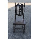 A Victorian carved oak side chair. 44.5 cm wide.