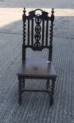 A Victorian carved oak side chair. 44.5 cm wide.