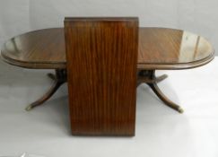 A reproduction twin pillar dining table. 309.5 cm long.