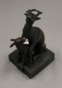 A double deer bronze seal. 12 cm high.