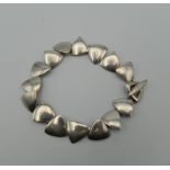 A Georg Jensen style silver bracelet. 17.5 cm long. 28.8 grammes.