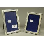 Two silver photograph frames. The largest 12 cm x 17 cm.