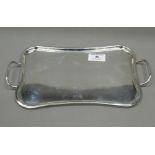 A small 900 silver tray. 29.5 cm wide. 8.9 troy ounces.