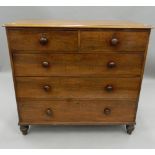 A 19th century mahogany chest of drawers. 109 cm wide. The property of Germaine Greer.