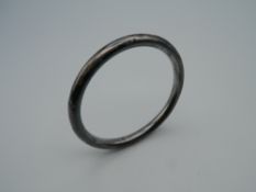 A Charles Horner silver bangle. 19.4 grammes.