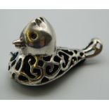 A silver pin cushion formed as a duck. 2 cm high.