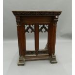 A Victorian carved oak lectern. 68.5 cm wide, 84 cm high, 61 cm deep.