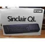 A boxed Sinclair QL computer