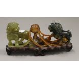 A carved jade model two dogs-of-fo. 21 cm wide.
