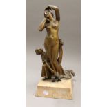 An early 20th century patinated bronze model of an Arab and nude lady. 41.5 cm high.