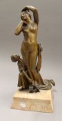 An early 20th century patinated bronze model of an Arab and nude lady. 41.5 cm high.